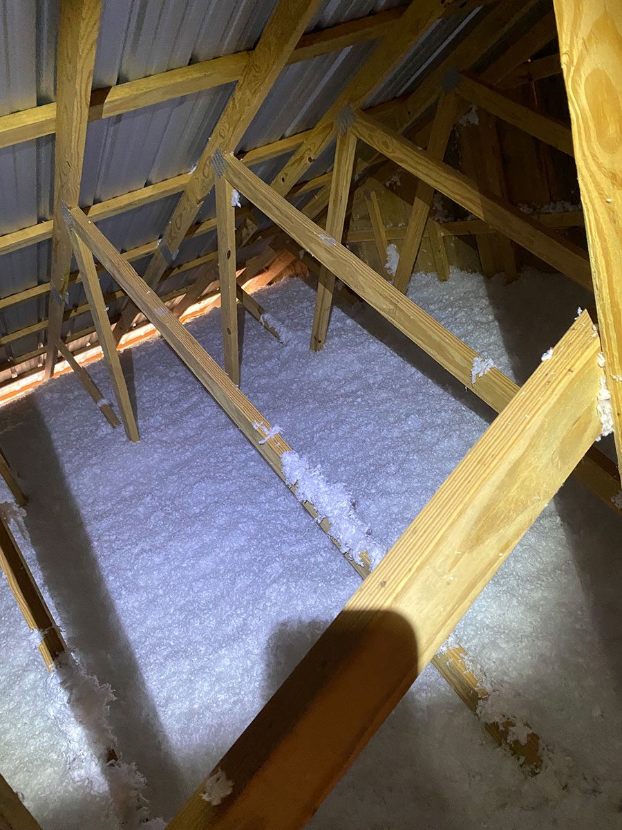 Blown-in attic insulation between trusses — Mississippi