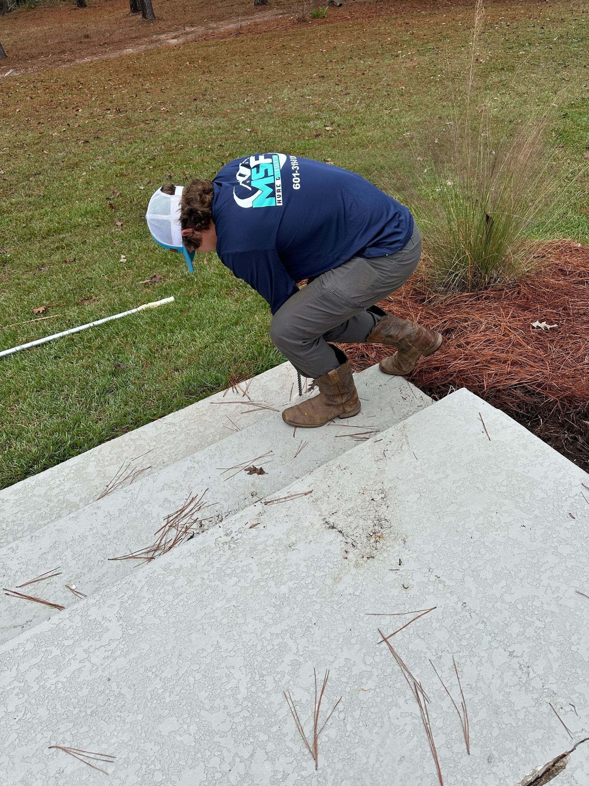 Slab jacking and concrete leveling